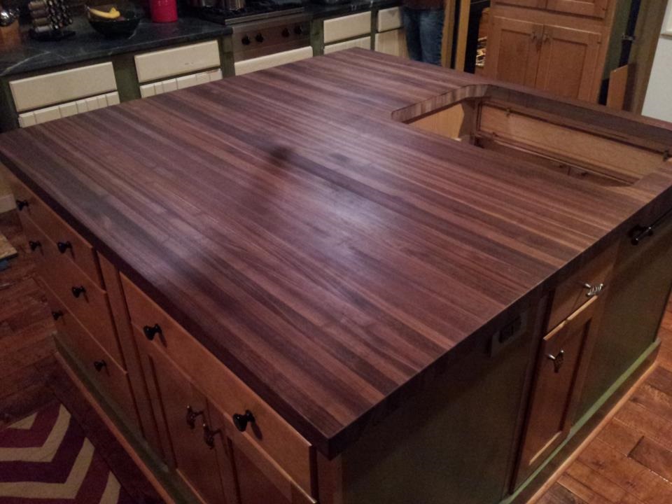 Large walnut butcher block surface for existing kitchen island.